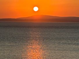 A sunset over the ocean at Ferncliffe in Morecambe