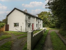 A house with a garden and pathway at Neuadd Wen in Gaerwen