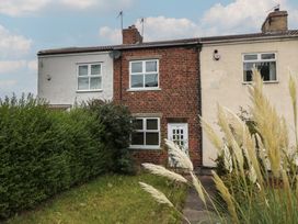 A house with windows and a door at 23 South Lackenby