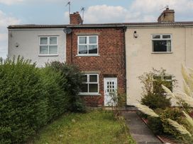 A house with a front garden and pathway at 23 South Lackenby