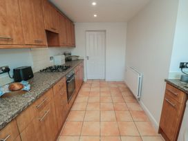 A kitchen with cabinets, oven, and countertop at 23 South Lackenby in Eston