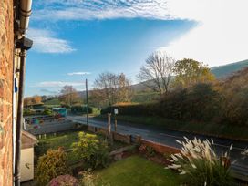 A view from a house looking at a road and hills at 23 South Lackenby Eston