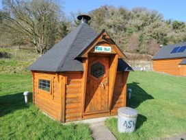 A BBQ hut in a grassy area at Pencarrow in St Breward