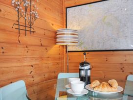 A dining room with a table set for breakfast at Trebah in St Breward