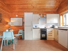 A kitchen with cabinets and appliances at Trebah in St Breward