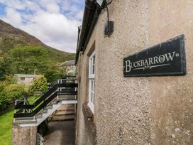 An exterior view of Buckbarrow with stairs and garden in Seascale