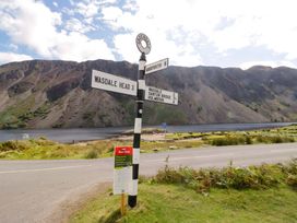 A signpost indicating directions at Wasdale in Seascale