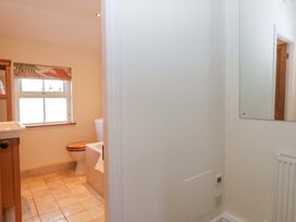 A bathroom with a sink and toilet at 11 Tram Lane in Kirkby Lonsdale