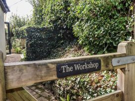 A gate with a sign reading 'The Workshop' at The Workshop in Mary Tavy