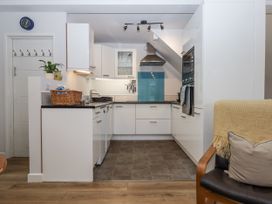 A kitchen with cabinets and a countertop at The Workshop in Mary Tavy