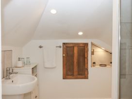 A bathroom with a sink and towel at The Workshop in Mary Tavy