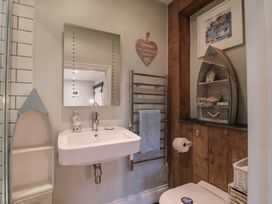 A bathroom with a sink and toilet at The Old Manor House in Lifton