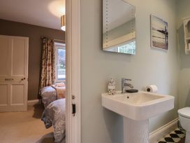 A bathroom with a sink and a toilet at The Old Manor House in Lifton