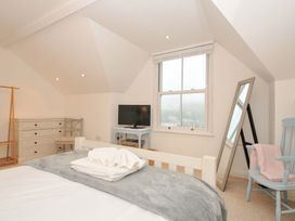 A bedroom with a bed and television at Overdale
