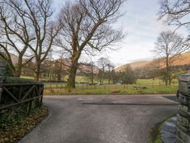 A view of trees and hills at Two Hollens in Ambleside
