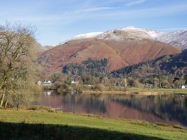 A landscape with mountains and a lake at Two Hollens Ambleside