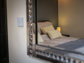A bedroom with a bed and pillows at Souterstead in Torver near Coniston
