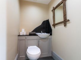 A bathroom with a toilet and sink at Souterstead in Torver near Coniston