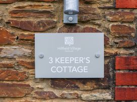 A wall plaque indicating 3 Keeper's Cottage at Hillfield Village Dartmouth