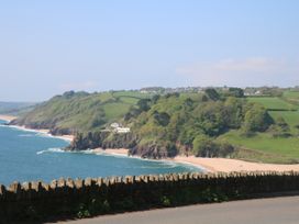 A coastal view with cliffs and beach at 3 Keepers Cottage