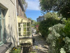 An outdoor view of a house and pathway at Penally Mews, St Dogmaels
