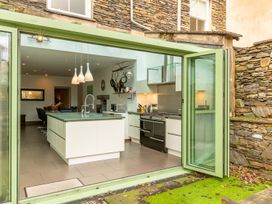 A kitchen with an island and appliances at The Boundary in Windermere