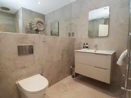 A bathroom with a toilet and wash basin at The Boundary in Windermere