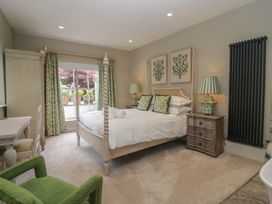A bedroom with a bed and bedside table at The Boundary in Windermere