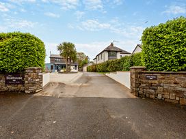 An outdoor view of a driveway leading to Sea Haze in Tenby