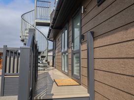 Exterior view showing a staircase and door at Lodge 1 Norwich