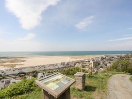 A viewpoint overlooking the beach and town at The Ingle in Barmouth