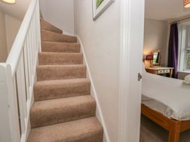 A staircase leading to a bedroom at Cloud Cottage Ambleside