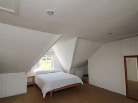 A bedroom with a bed and window at 36 Crowthers Hill in Dartmouth