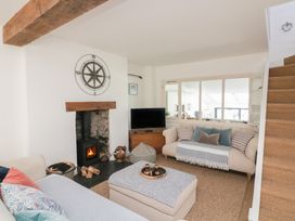 A living room with a television and fireplace at 36 Crowthers Hill Dartmouth