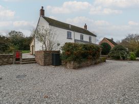 A house with a garden and pathway at 3 bed property