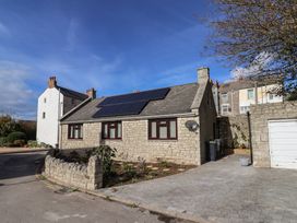 A house with solar panels at Arum, Portland Bill