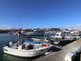 Boats at a marina at Arum Portland Bill