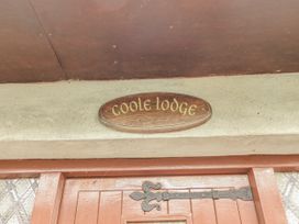 A sign above a door indicating Coole Lodge at Coole Gate Lodge, Gort, County Galway