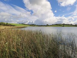 A landscape with water and reeds at Woodlawn Retreat in Portanure near Lough Gowna