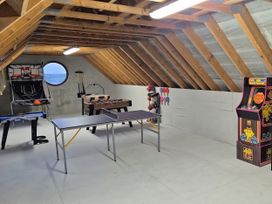 A game room with various tables and games at Woodlawn Retreat in Portanure near Lough Gowna