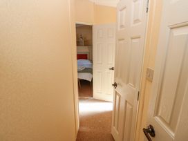 A view of a hallway leading to a bedroom at Number 38 in Chichester