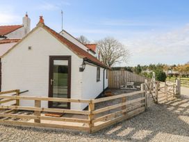 An outdoor area of a house with a fenced entrance at 1 Small in Malton