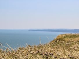 A cliffside overlooking the ocean at a coastal location