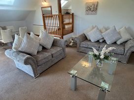 A living room with a sofa and coffee table at East Cottage East Knapton near Rillington
