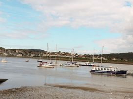 A view of boats in water with houses in the background at 8 Watkin Street Conwy