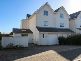 A house with garage and windows at 2 Lon Y Dryw in Trearddur Bay