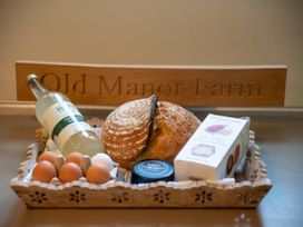 A tray with bread, eggs, drink and crackers at Old Manor Farm in Low Ham near Langport