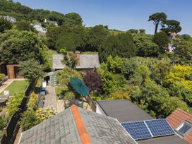 An outdoor view of gardens and houses at Shipwrights in Salcombe