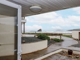 An outdoor view of the sea with a rock formation at 8 Thurlestone Rock in Kingsbridge