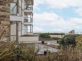 An outdoor area with a building, balcony, and ocean view at 8 Thurlestone Rock in Kingsbridge